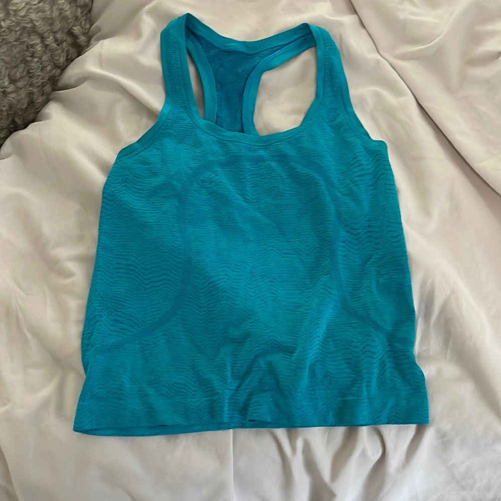 selling turquoise work out tank lulu